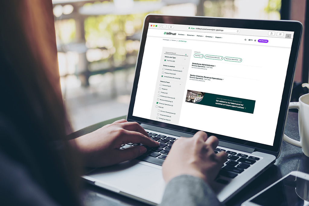 Billtrust Job Listings Updated UI Mockup with individual using computer