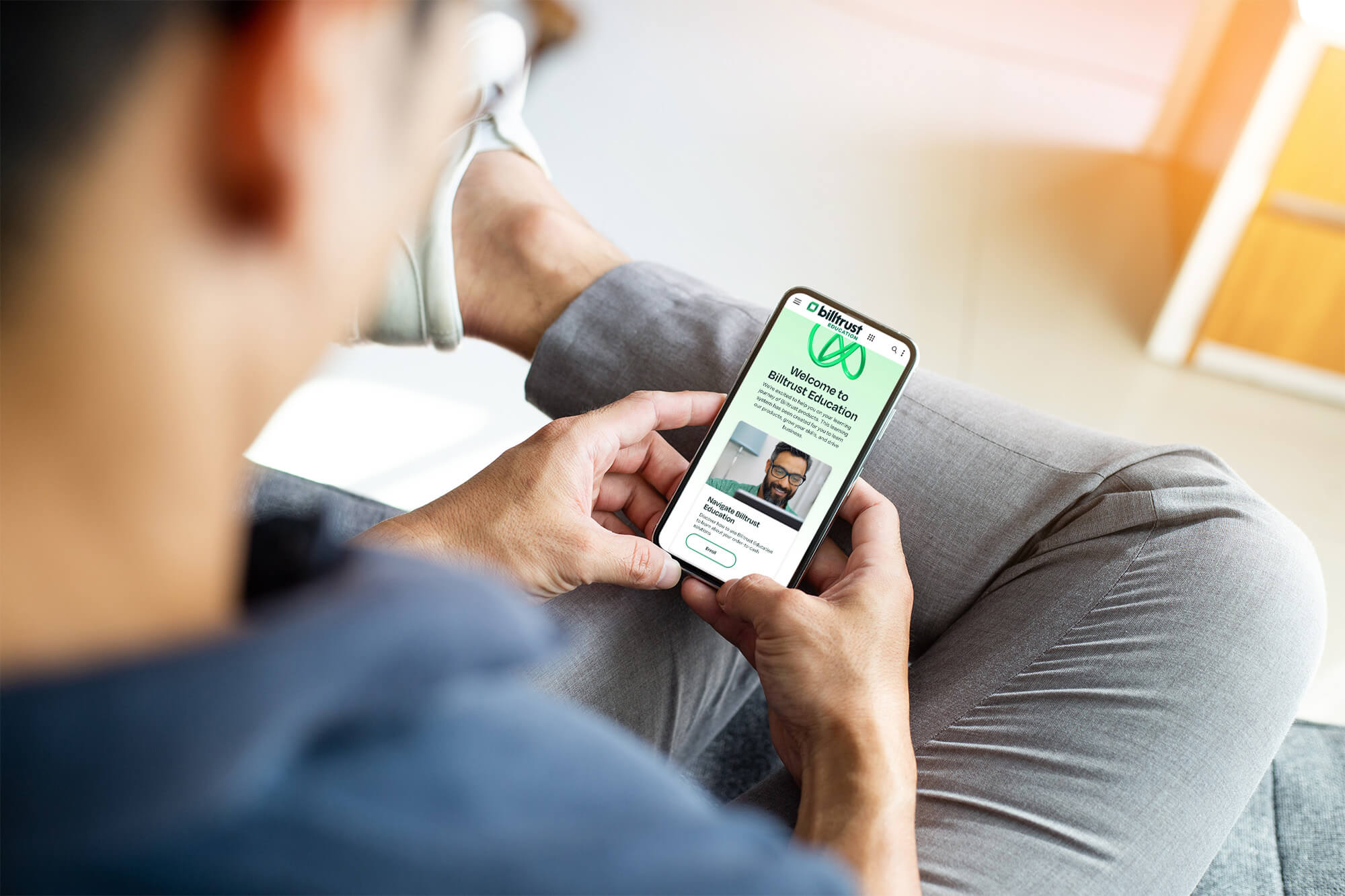 Billtrust Education Mobile Mockup person holding phone